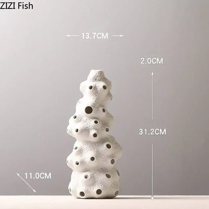 Textured white ceramic vase set with artificial flowers living room