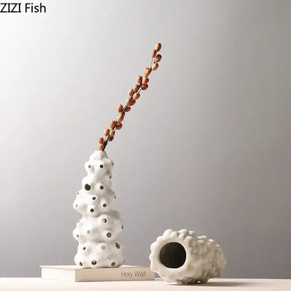 Textured white ceramic vase set with artificial flowers living room