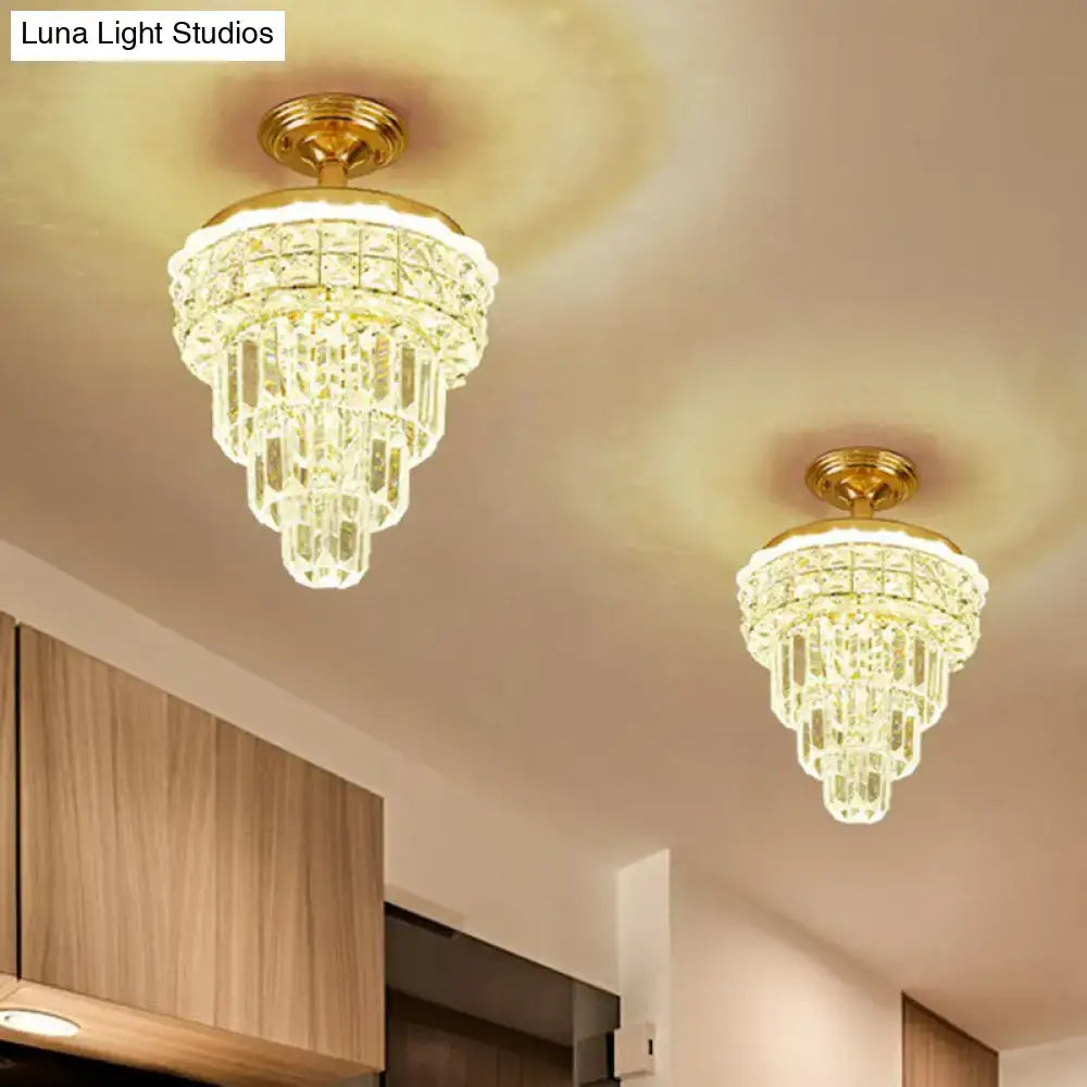 Tiered gold and optical crystal foyer chandelier