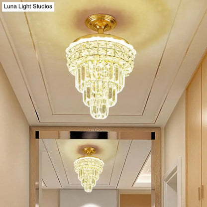 Tiered gold and optical crystal foyer chandelier