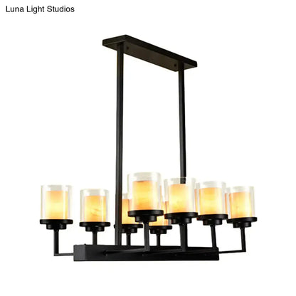 Traditional black cylinder dining room light with clear glass bulbs