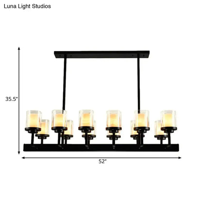 Traditional black cylinder dining room light with clear glass bulbs