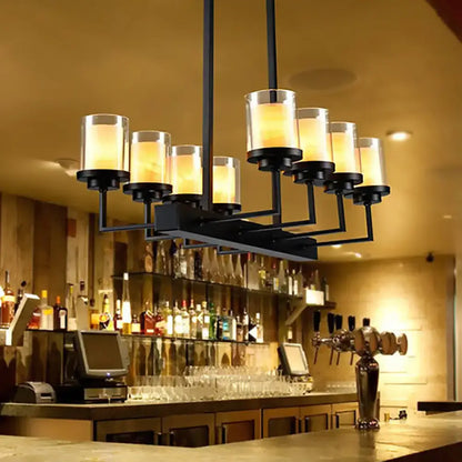 Traditional black cylinder dining room light with clear glass bulbs