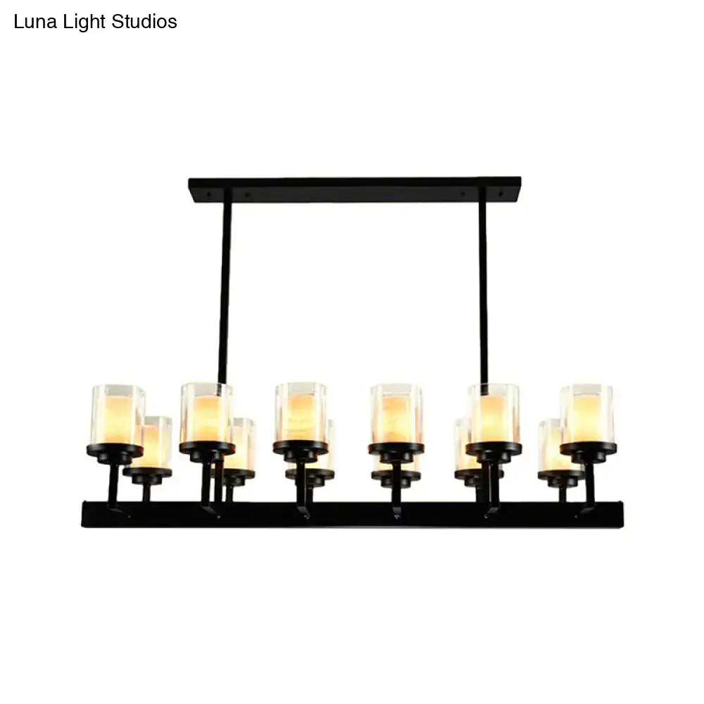 Traditional black cylinder dining room light with clear glass bulbs