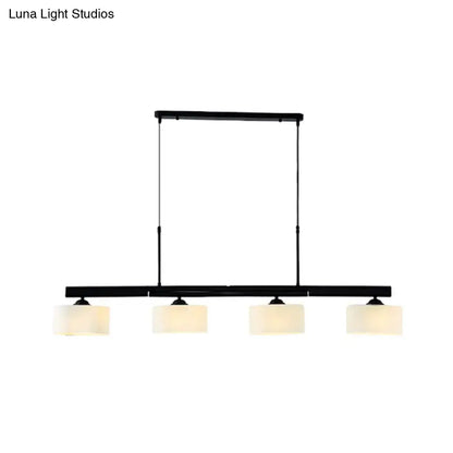 Traditional black drum island pendant with white shades dining room