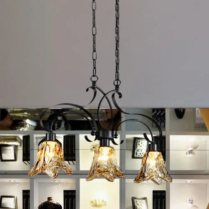 Traditional black island lamp with amber glass dining room chandelier