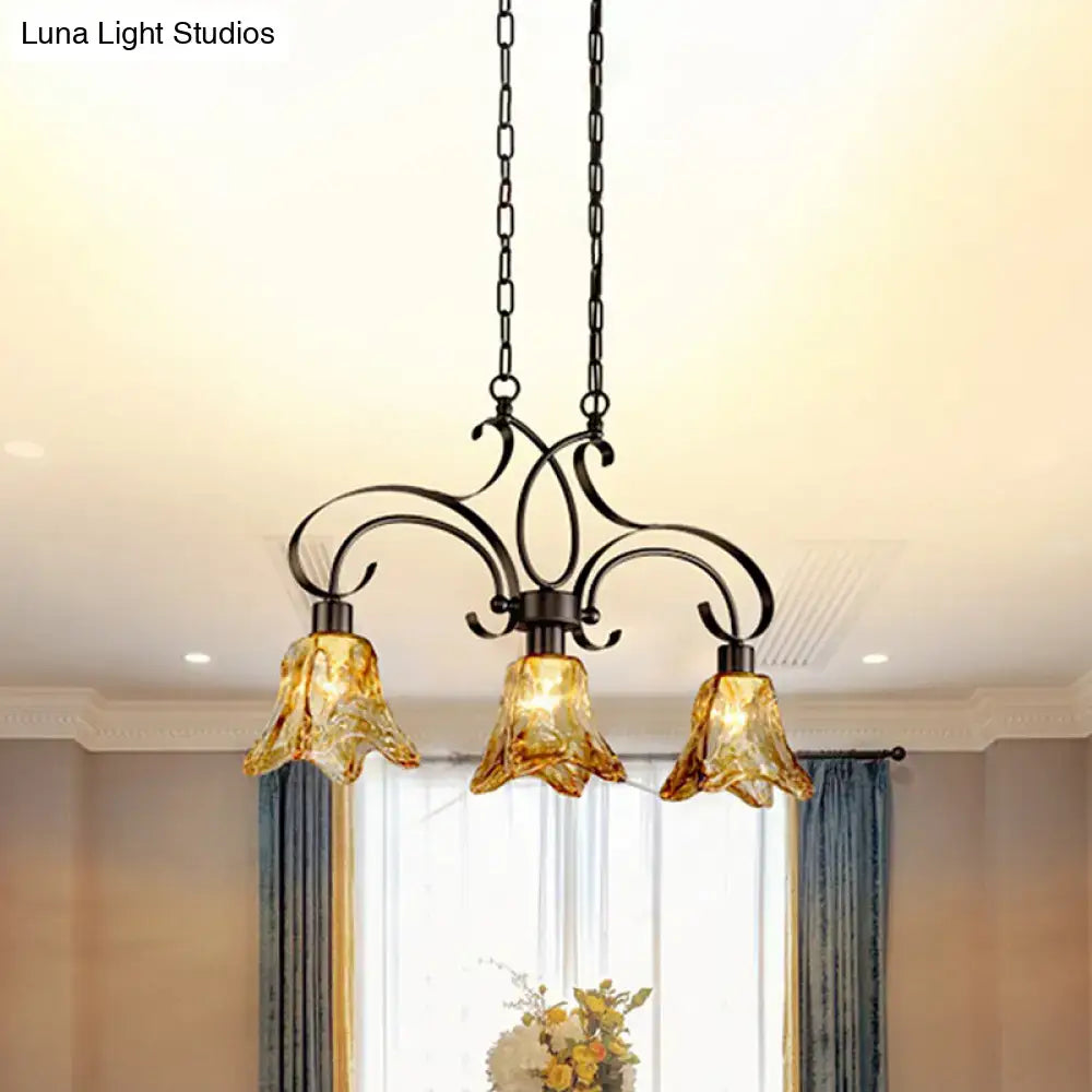 Traditional black island lamp with amber glass dining room chandelier