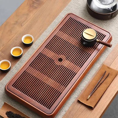 Traditional brown bamboo tea tray with water storage for dining room