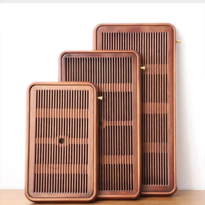 Traditional brown bamboo tea tray with water storage for dining room