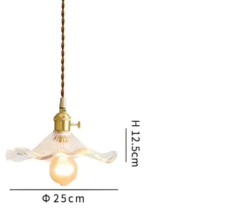 Translucent blue glass pendant light with brass fixture for dining room