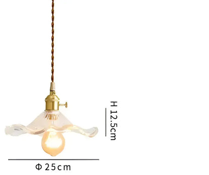 Translucent blue glass pendant light with brass fixture for dining room