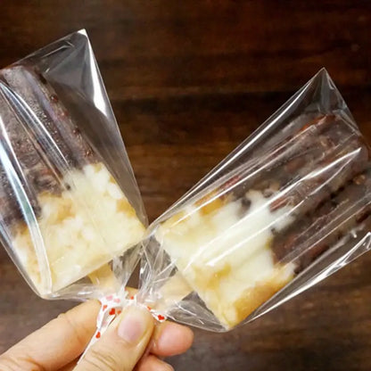Transparent pink ice cream bags kitchen storage with gold ribbon