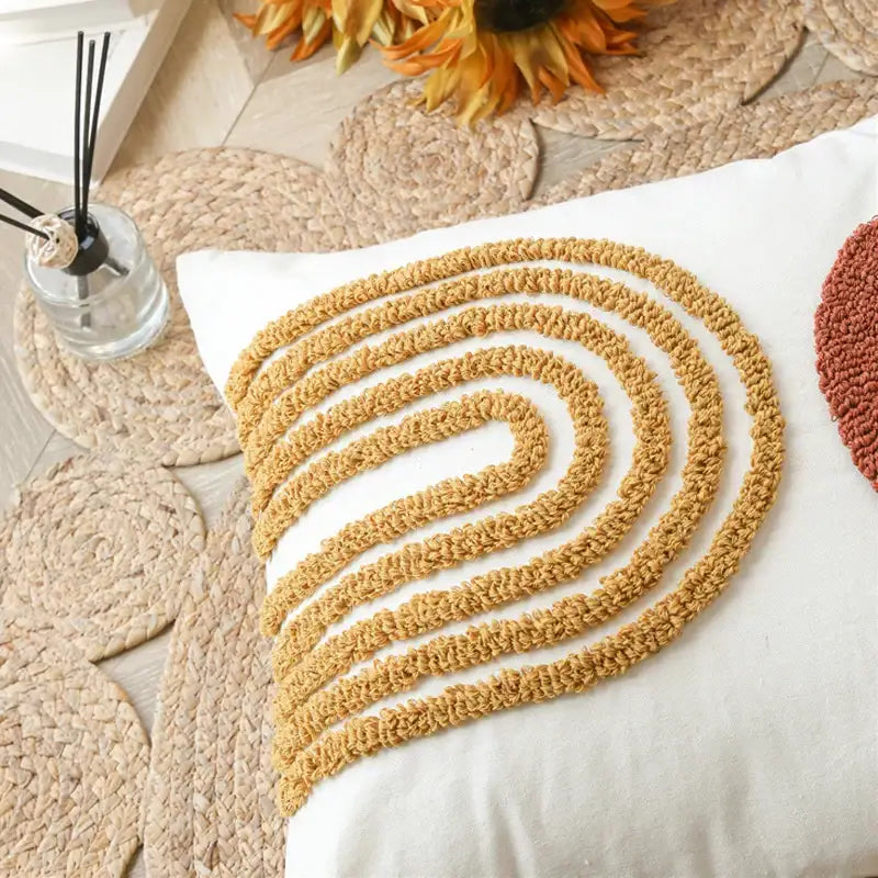 Tufted burnt orange and yellow cushion cover living room