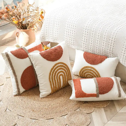 Tufted burnt orange and yellow cushion cover living room