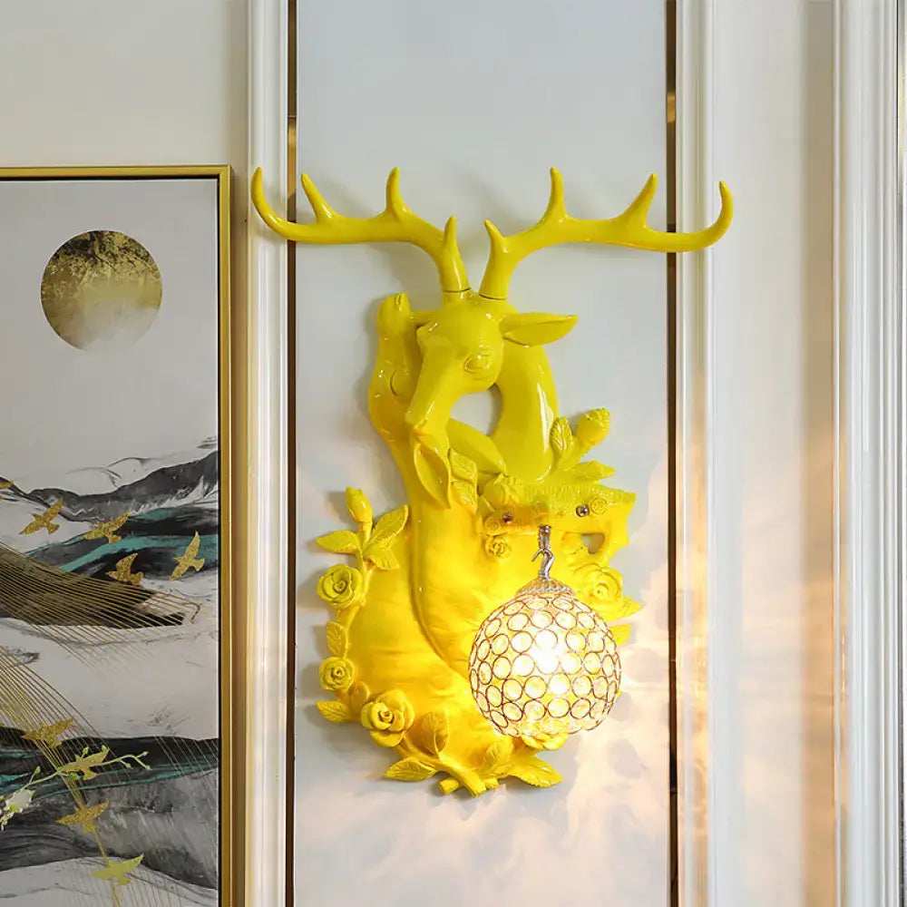 Vibrant yellow floral deer head accent crystal sconce bedroom light