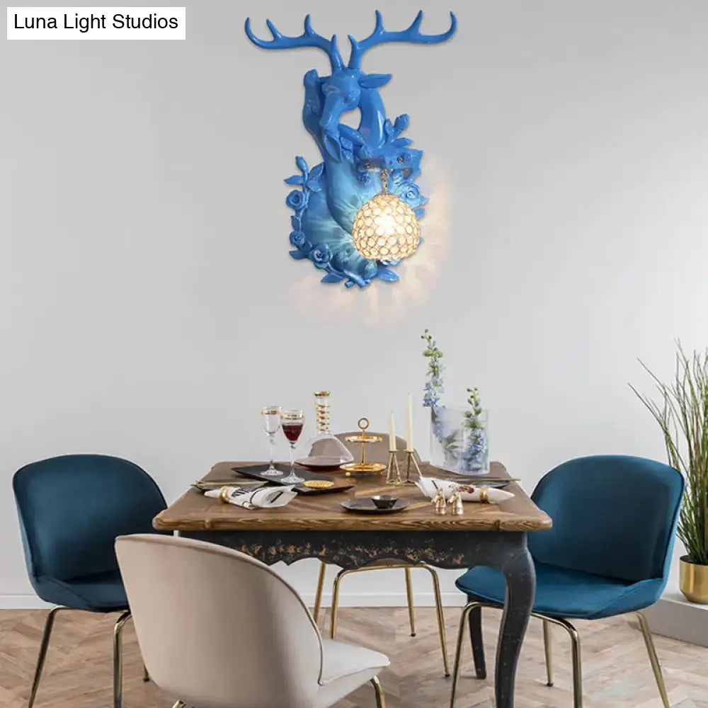 Vibrant yellow floral deer head accent crystal sconce bedroom light
