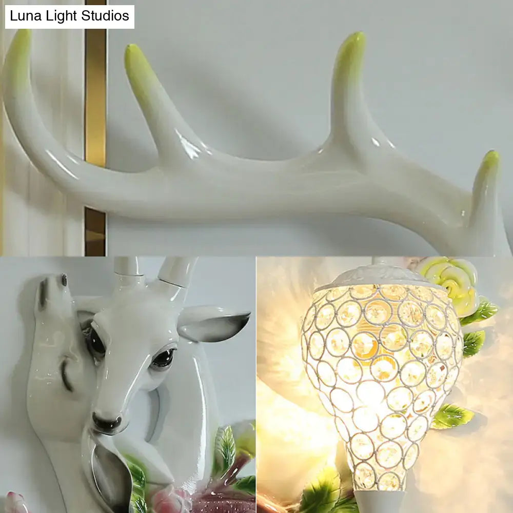 Vibrant yellow floral deer head accent crystal sconce bedroom light