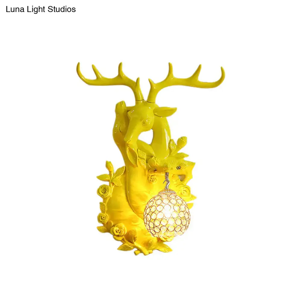 Vibrant yellow floral deer head accent crystal sconce bedroom light