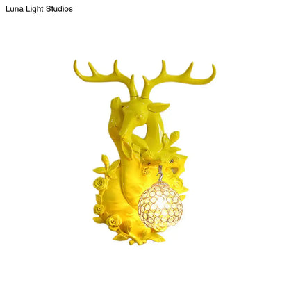 Vibrant yellow floral deer head accent crystal sconce bedroom light