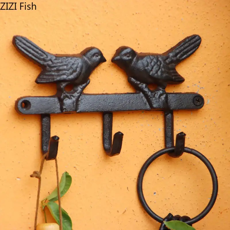 Vintage black iron bird hook wall shelf for entryway storage
