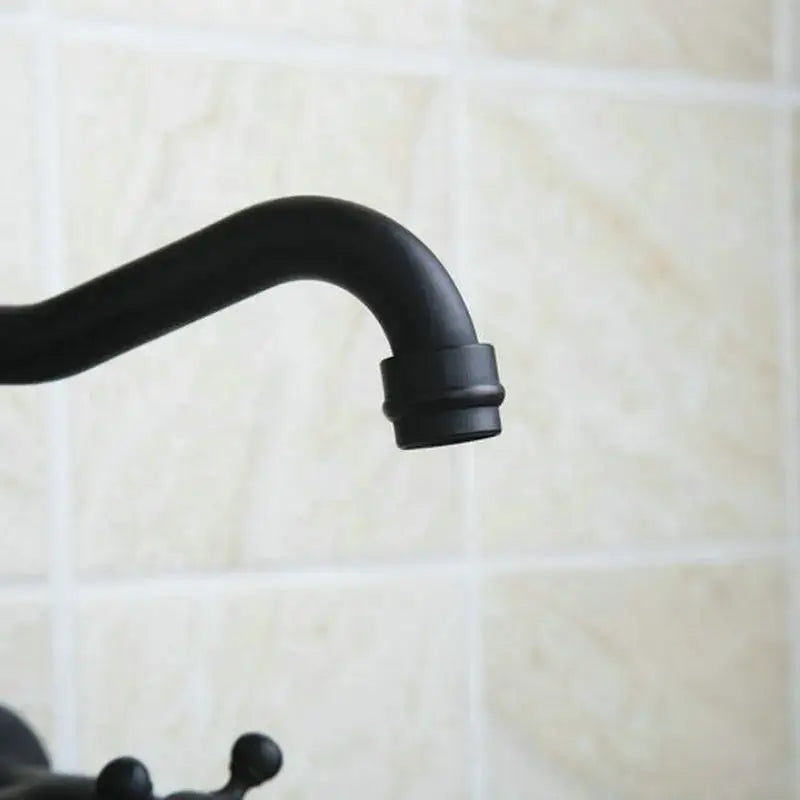 Vintage black swivel wall mounted bathroom faucet with ceramic base