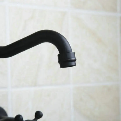 Vintage black swivel wall mounted bathroom faucet with ceramic base