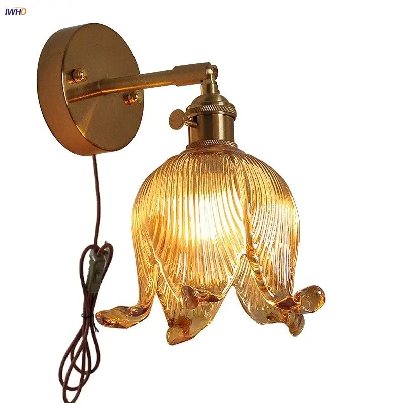 Vintage brass and amber glass wall light bedroom flower sconce