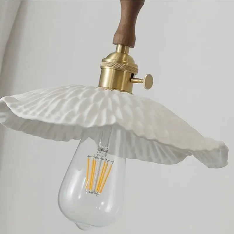 Vintage brass and ceramic walnut wood pendant light study aisle