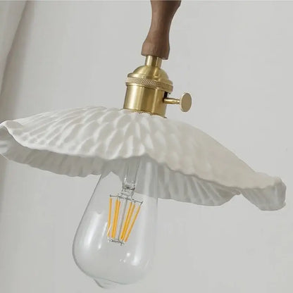 Vintage brass and ceramic walnut wood pendant light study aisle