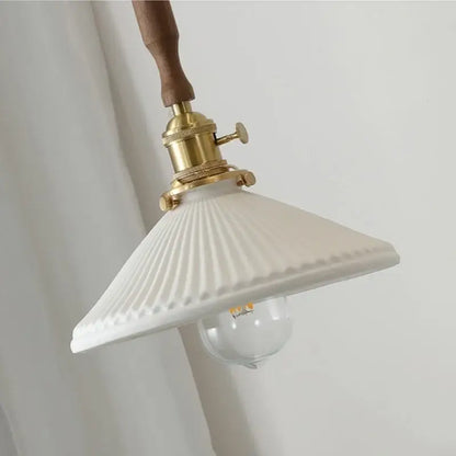 Vintage brass and ceramic walnut wood pendant light study aisle