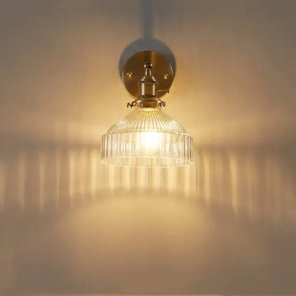 Vintage brass and clear glass wall lamp with pull chain switch bedroom