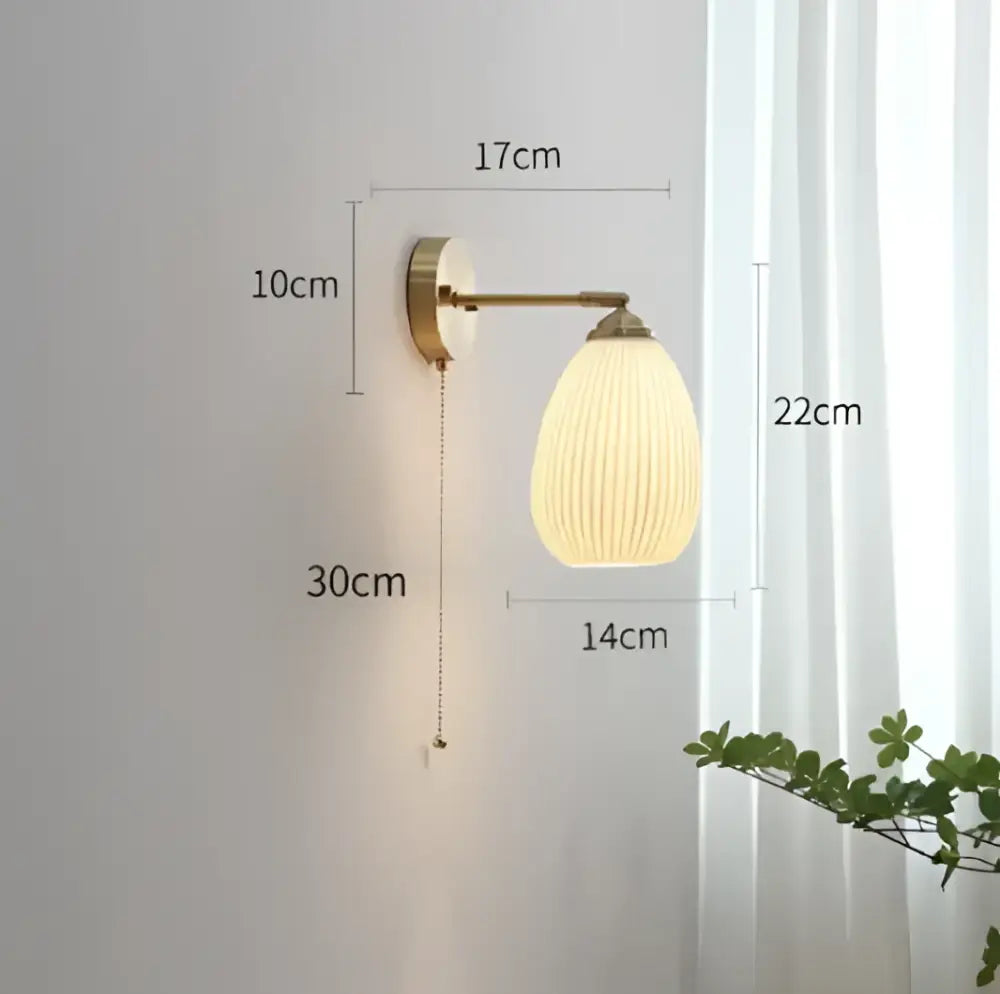 Vintage brass ceramic wall lamp with ribbed glass shade for bedroom