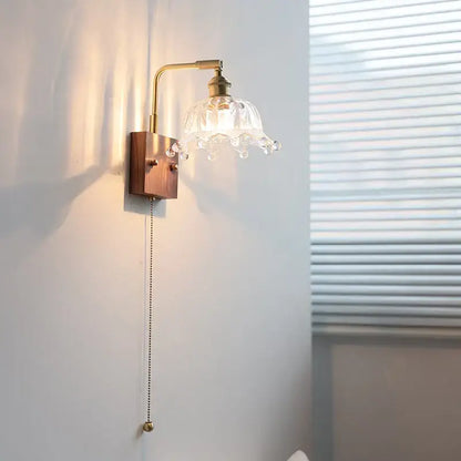Vintage brass wall light with etched clear glass bedroom sconce