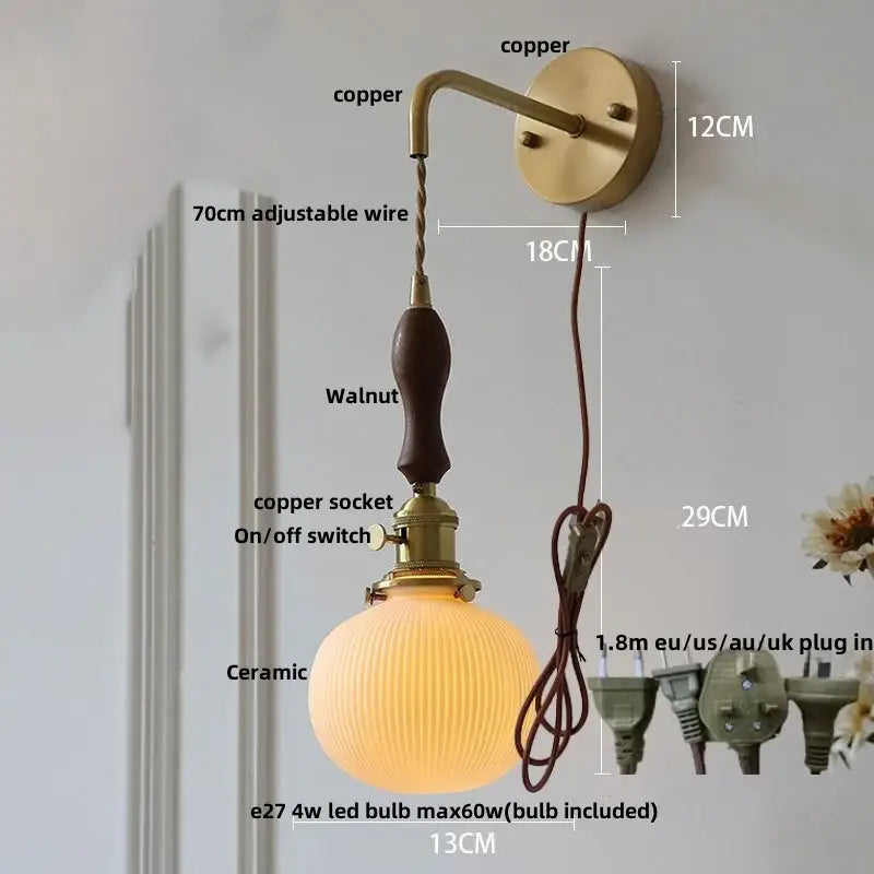 Vintage brass wall light with ribbed glass and knob switch bedroom