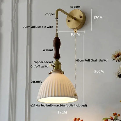 Vintage brass wall light with ribbed glass and knob switch bedroom
