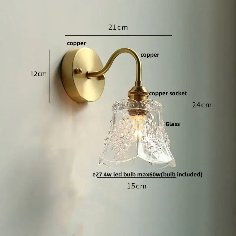 Vintage brass wall sconce with scalloped clear glass for stairways