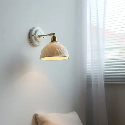 Vintage ceramic wall lamp with fluted glass shade for bedroom