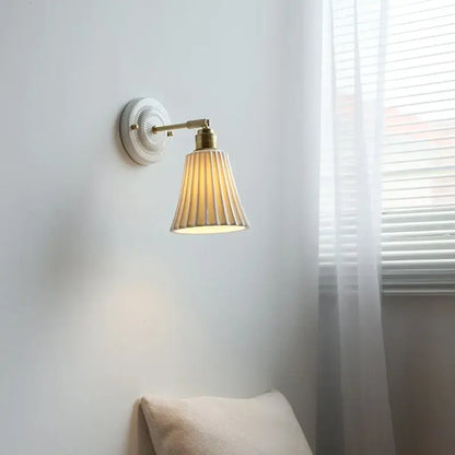 Vintage ceramic wall lamp with fluted glass shade for bedroom