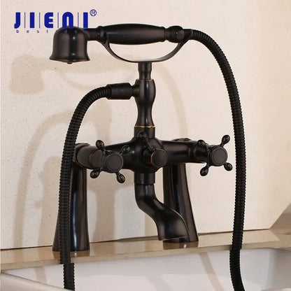 Vintage chrome bathtub faucet with dual handles and hand shower bathroom