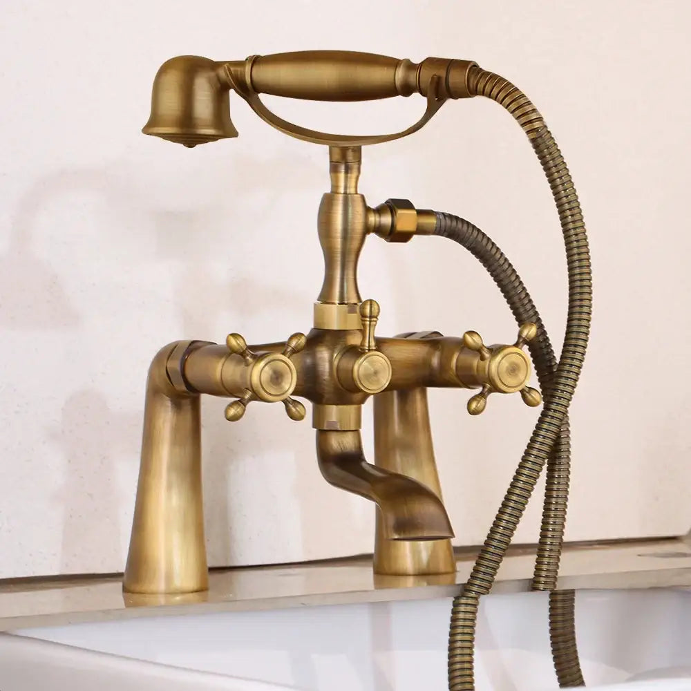 Vintage golden bathtub faucet with floral handshower – bathroom decor