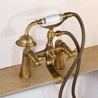 Vintage golden bathtub faucet with floral handshower – bathroom decor
