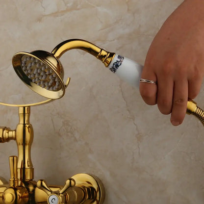 Vintage golden bathtub faucet with floral handshower – bathroom decor