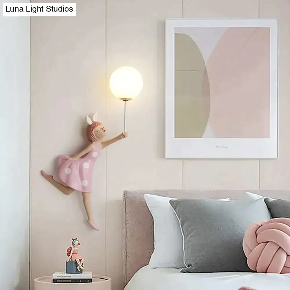 Whimsical pink polka dot fairy girl wall lamp for bedroom