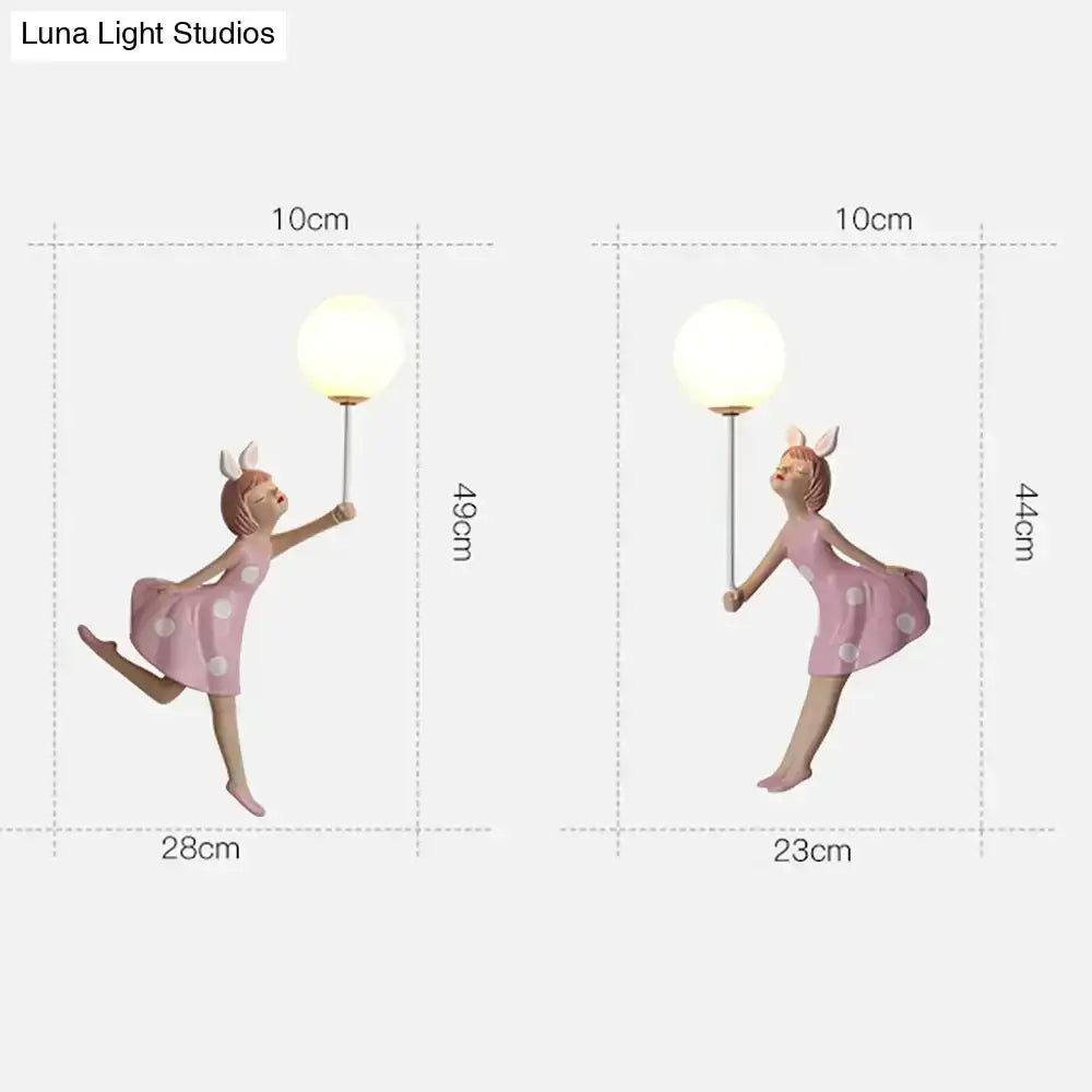Whimsical pink polka dot fairy girl wall lamp for bedroom
