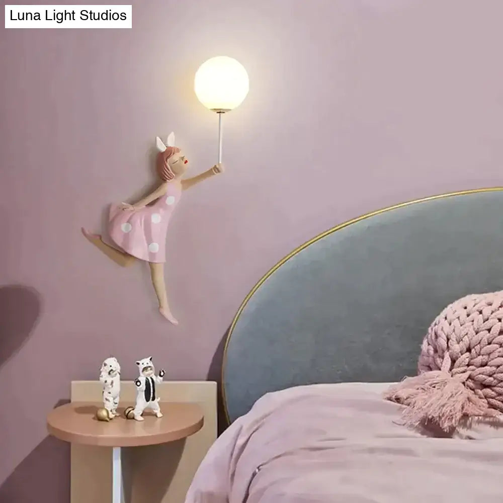Whimsical pink polka dot fairy girl wall lamp for bedroom