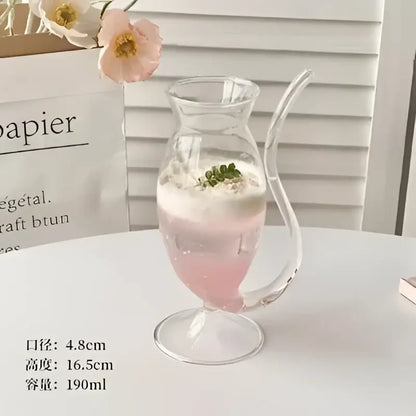 Whimsical pink vampire cocktail glass cup with straw dining room decor