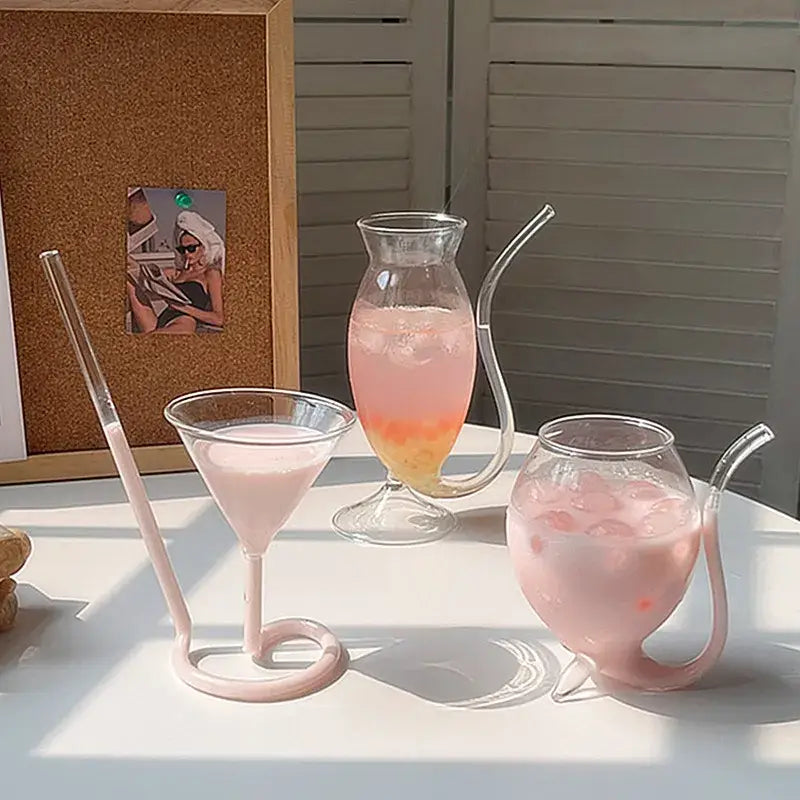 Whimsical pink vampire cocktail glass cup with straw dining room decor