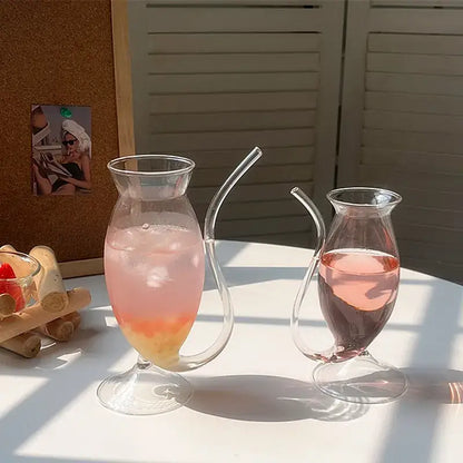 Whimsical pink vampire cocktail glass cup with straw dining room decor