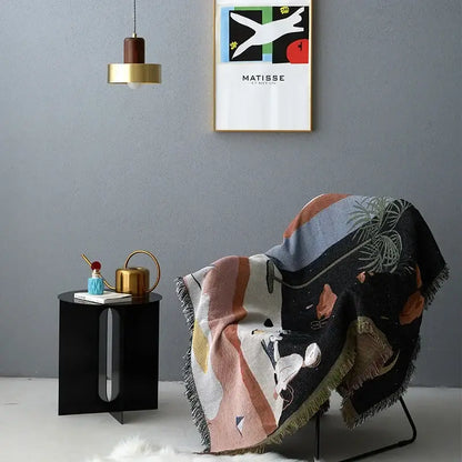 Whimsical space themed black knit sofa blanket living room decor