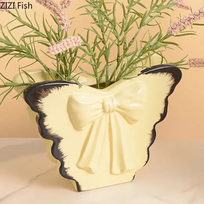 White butterfly ceramic vase with pink bow living room decor